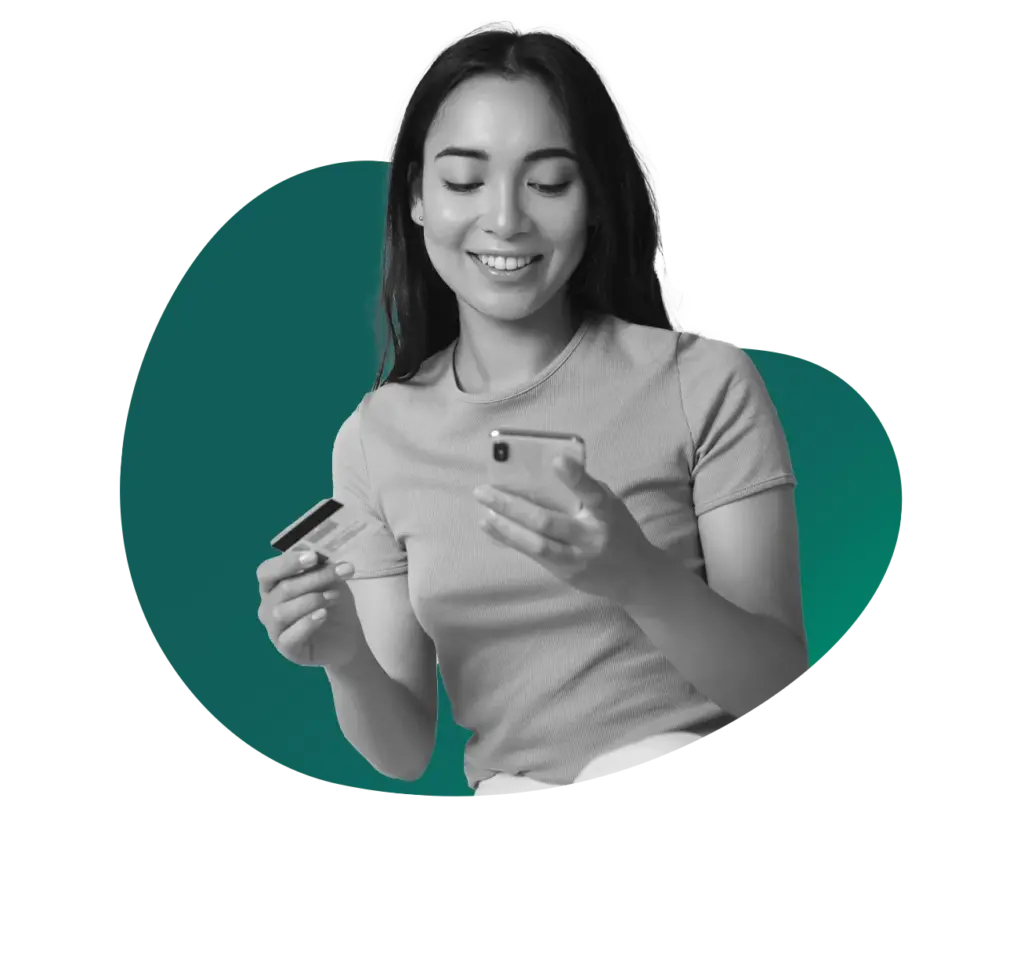 woman with credit card and phone